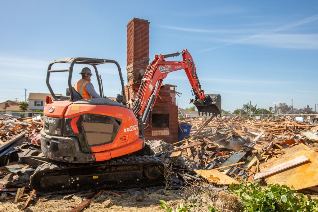 FMG excavator operator at a demolition site